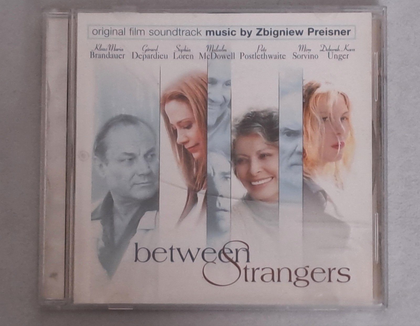 Between Strangers, Ophalen of Verzenden, Zo goed als nieuw