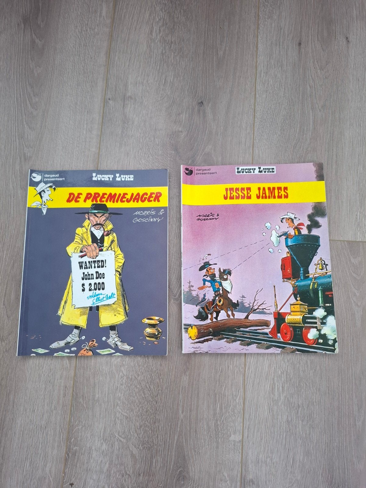 2 Stripboeken van Lucky Luke, Meerdere stripboeken, Ophalen, Gelezen, Dargaud Benelux