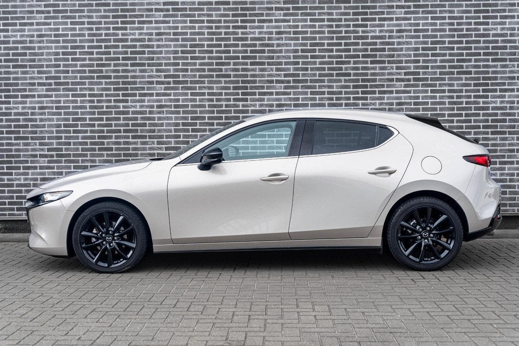 Mazda 3 2.0 e-SkyActiv-G M Hybrid 150 Homura | Head-Up Displ, Auto's, Mazda, 1998 cc, Stof, Gebruikt, 4 cilinders