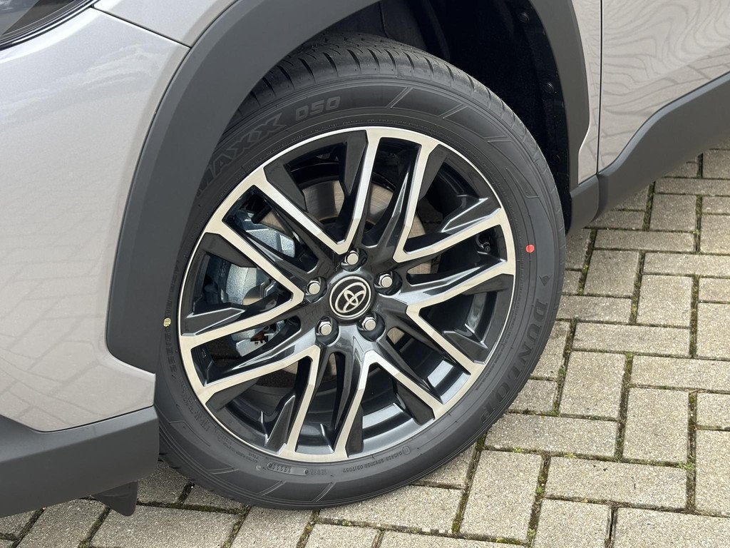 Toyota Corolla Cross Hybrid 180 Dynamic Prijs inc inruilprem, Auto's, Toyota, Stof, 1440 kg, Euro 6, Bedrijf