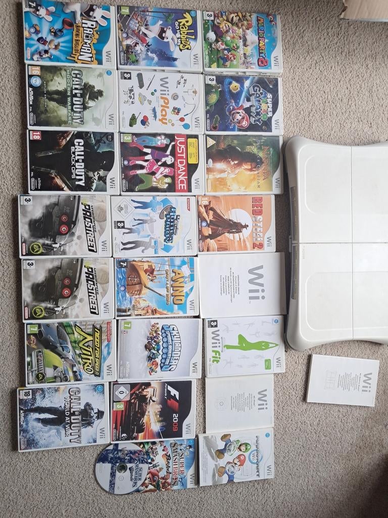 Wii games met balance board en boekjes, Gebruikt, Overige genres, Ophalen of Verzenden, 3 spelers of meer