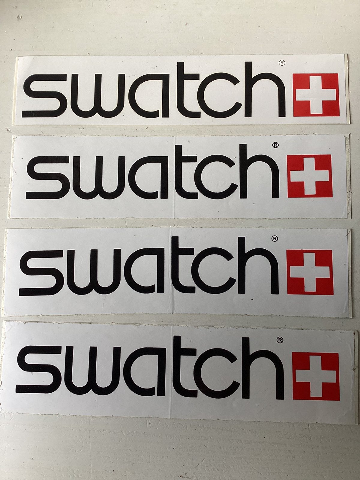 4 stickers Swatch, Verzenden, Zo goed als nieuw, Merk