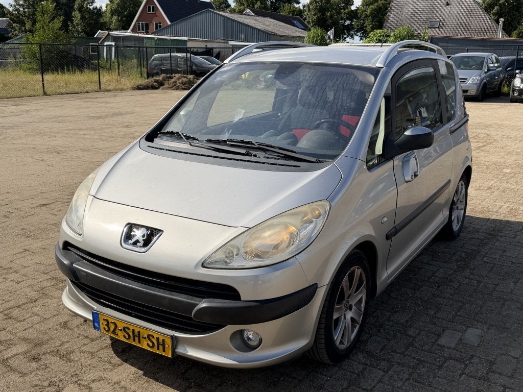 Peugeot 1007 1.4 Gentry| GRIJS| 167DKM NAP| CLIMA| CRUISE| L, Voorwielaandrijving, Stof, 4 cilinders, 4 stoelen