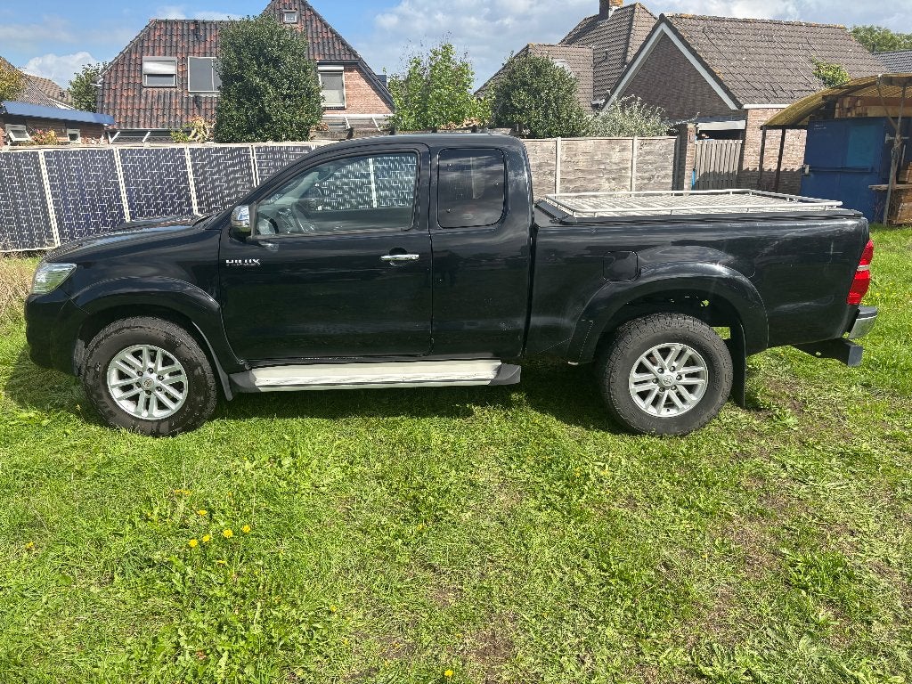 Toyota Hi-lux 2015. <90 000 origineel Nederlands NAP MARGE, Auto's, Stof, Zwart, 2800 kg, Zwart