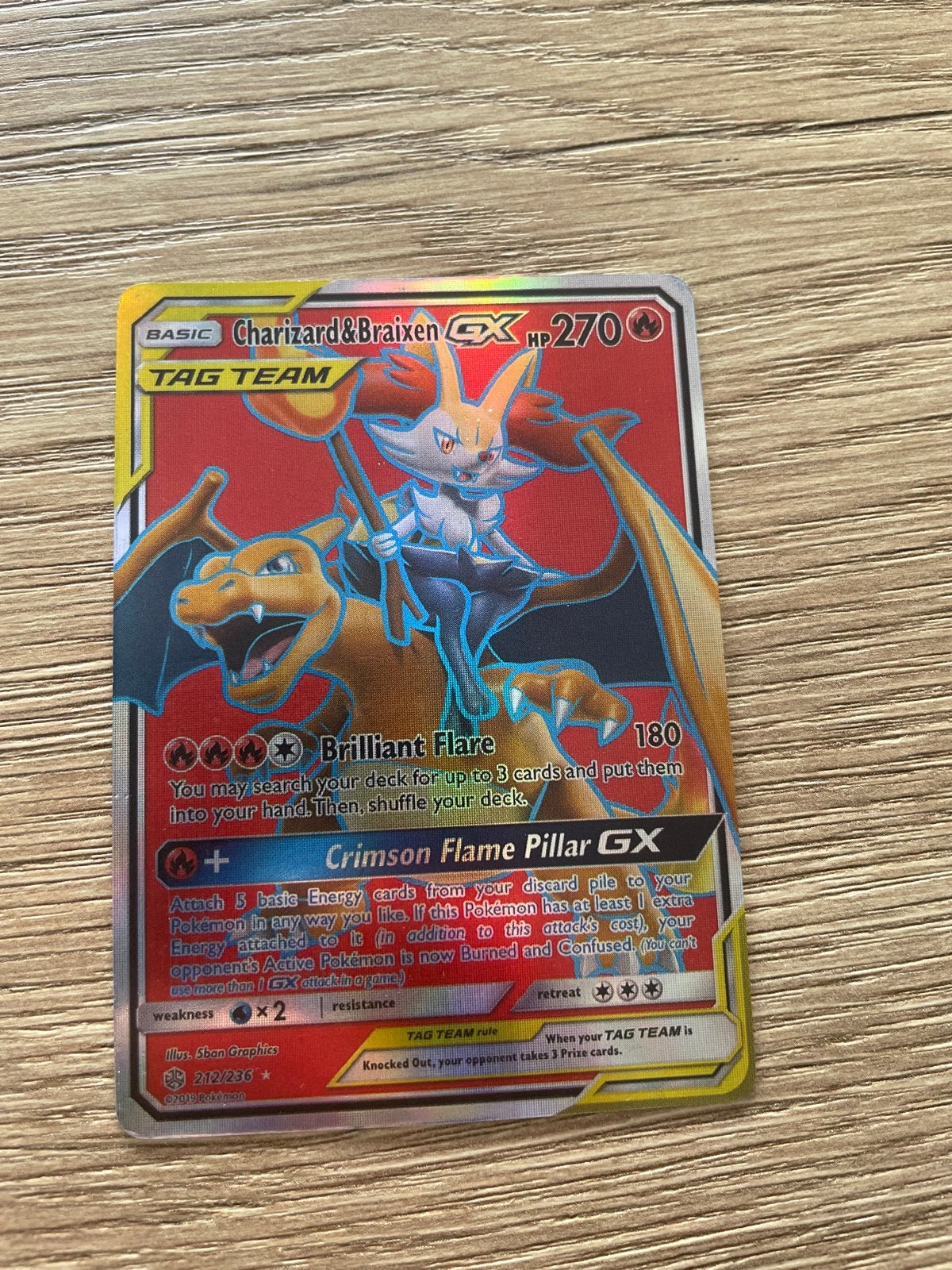 Charizard & Braixen GX TAG TEAM Pokemon kaart, Ophalen of Verzenden, Zo goed als nieuw, Losse kaart