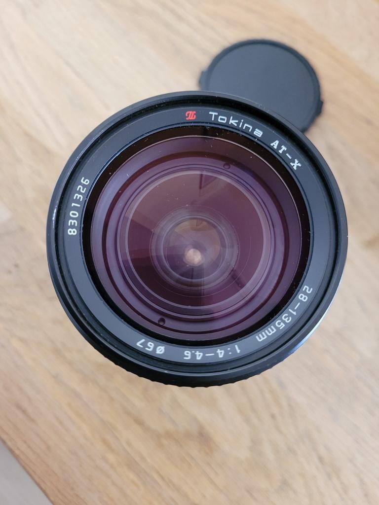 Tokina AT-X 28-135mm zoomlens met tas, Audio, Tv en Foto, Fotografie | Lenzen en Objectieven, Ophalen of Verzenden, Gebruikt, Telelens