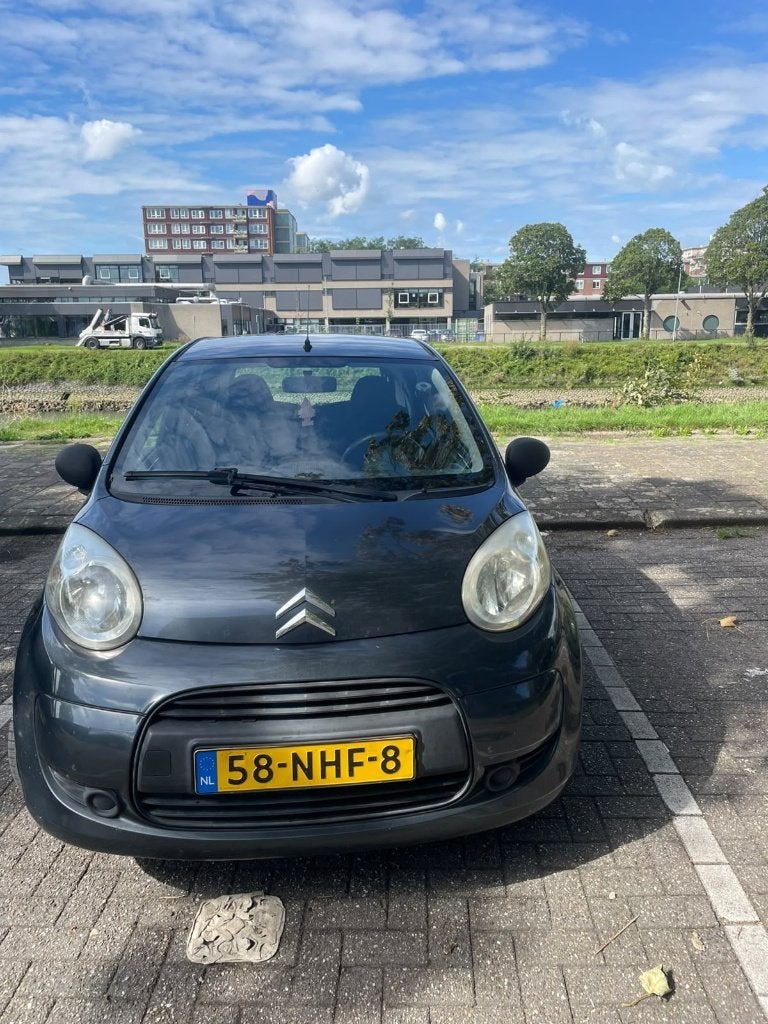 Citroën C1 1.0 5-DRS 2010 Grijs, Auto's, Achterwielaandrijving, Zwart, 4 stoelen, C1