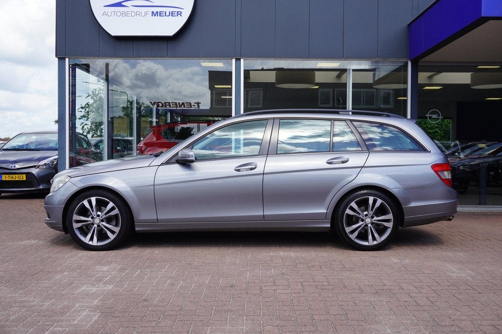 Mercedes-Benz C-klasse Estate 180 K Business Class Handgesch, Auto's, Mercedes-Benz, 13 km/l, Gebruikt, Zwart, 1435 kg