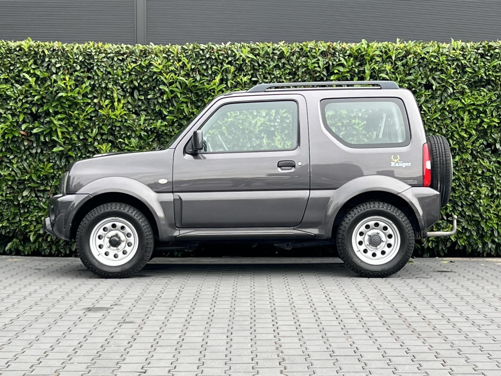 Suzuki Jimny 1.3 Exclusive RANGER AUTOMAAT, AIRCO, STOELVERW, Automaat, Gebruikt, Zwart, 4 stoelen