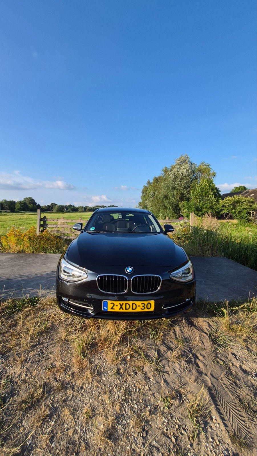 BMW 1-Serie 114I 75KW 5-DR 2014 Zwart, Auto's, BMW, 1-Serie, Verwarmde buitenspiegels, Achterwielaandrijving, 4 cilinders