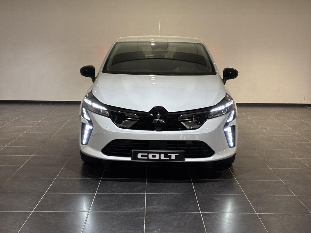 Mitsubishi Colt 1.6 HEV Intense | Voorraad voordeel | 8 jaar, Auto's, Mitsubishi, Stof, Euro 6, Blauw, Bedrijf