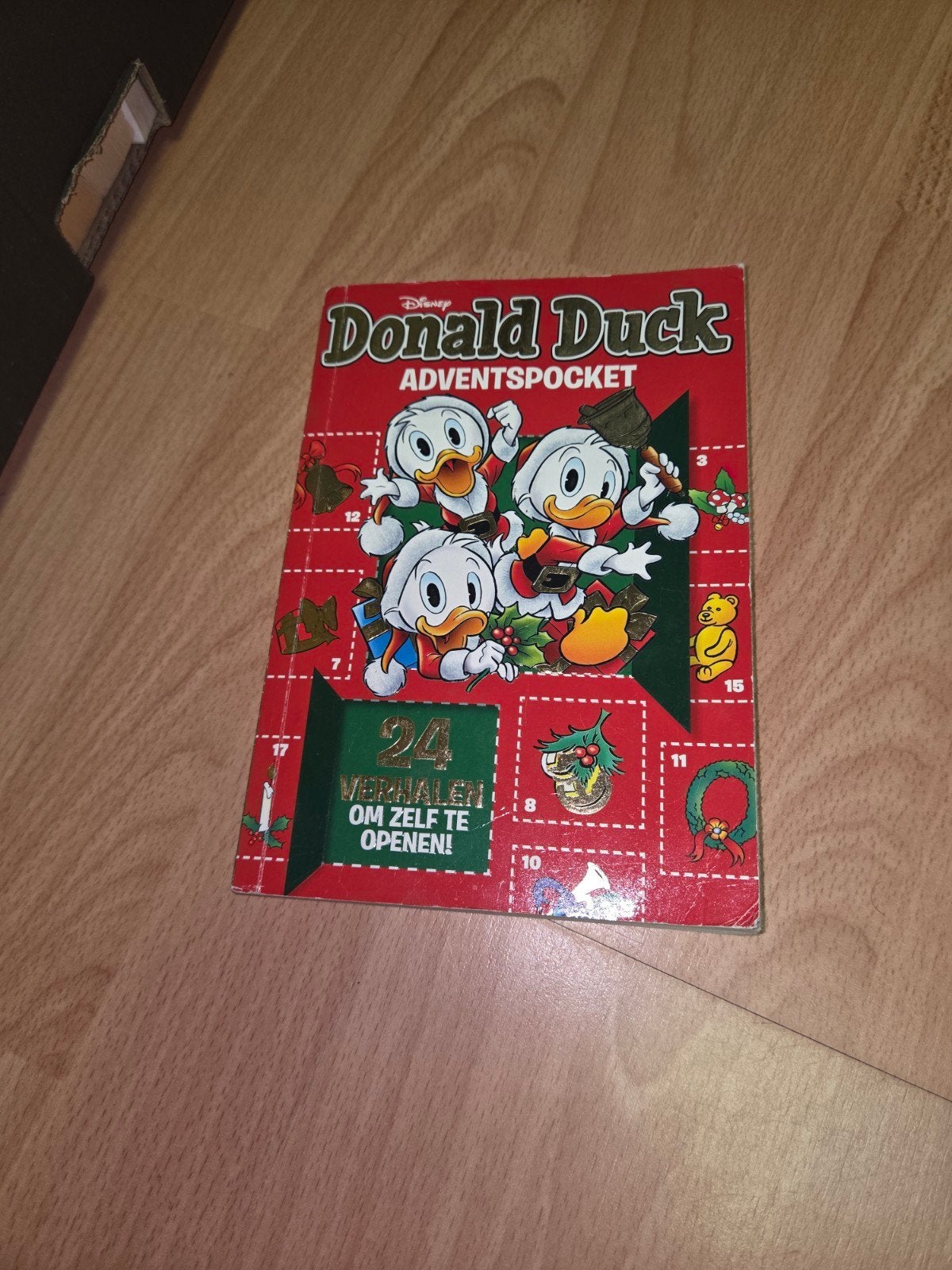 Donald Duck Adventspocket - 24 Verhalen om zelf te openen, Eén stripboek, Ophalen of Verzenden, Gelezen, Walt Disney