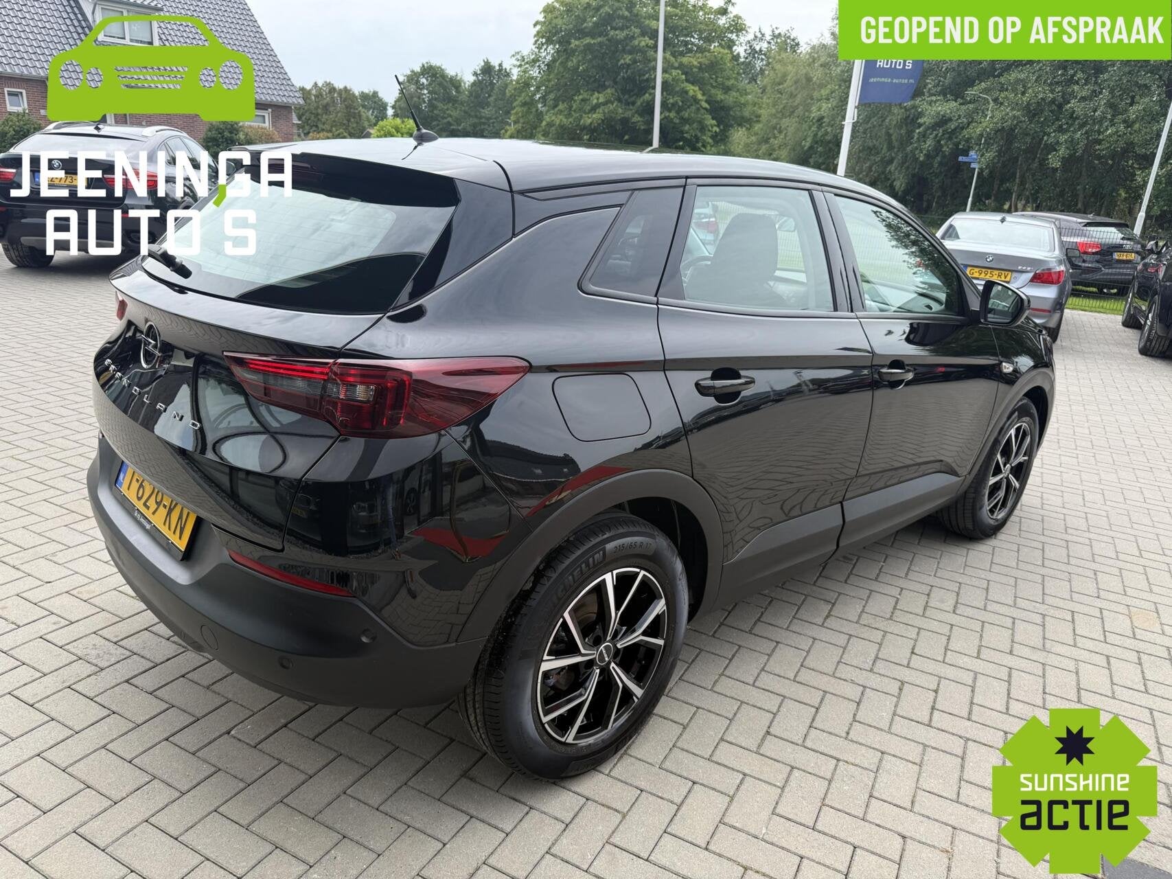 Opel Grandland 1.2 Turbo Level 2|PDC|AppleCarPlay|Clima|NAP, Auto's, Stof, Gebruikt, 1199 cc, Zwart