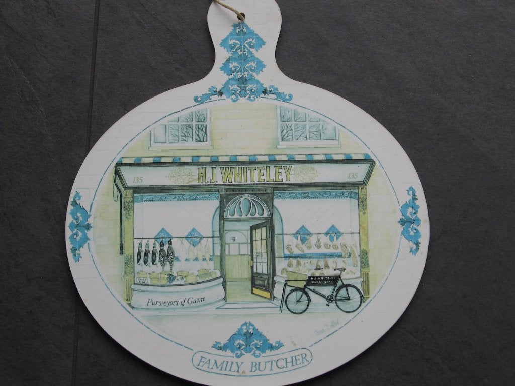 Een houten sierbord "Family Butcher" mt 28 x 25 cm., Overige typen, Ophalen of Verzenden, Zo goed als nieuw
