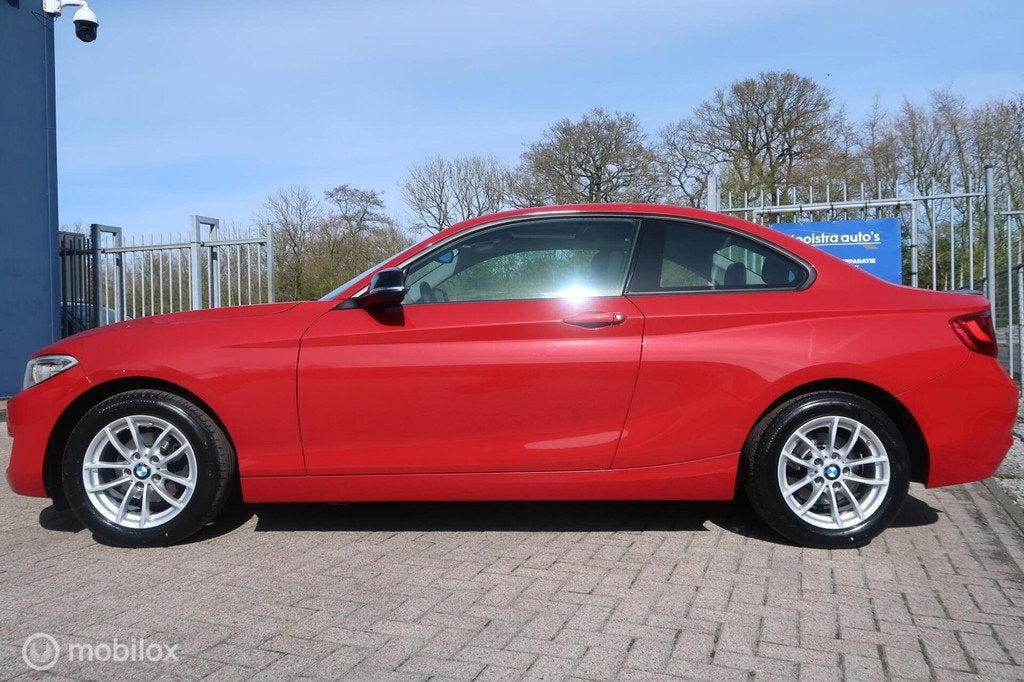 BMW 2-serie Coupé 218i Centennial Executive, Auto's, BMW, Gebruikt, 4 stoelen, Handgeschakeld, 3 cilinders