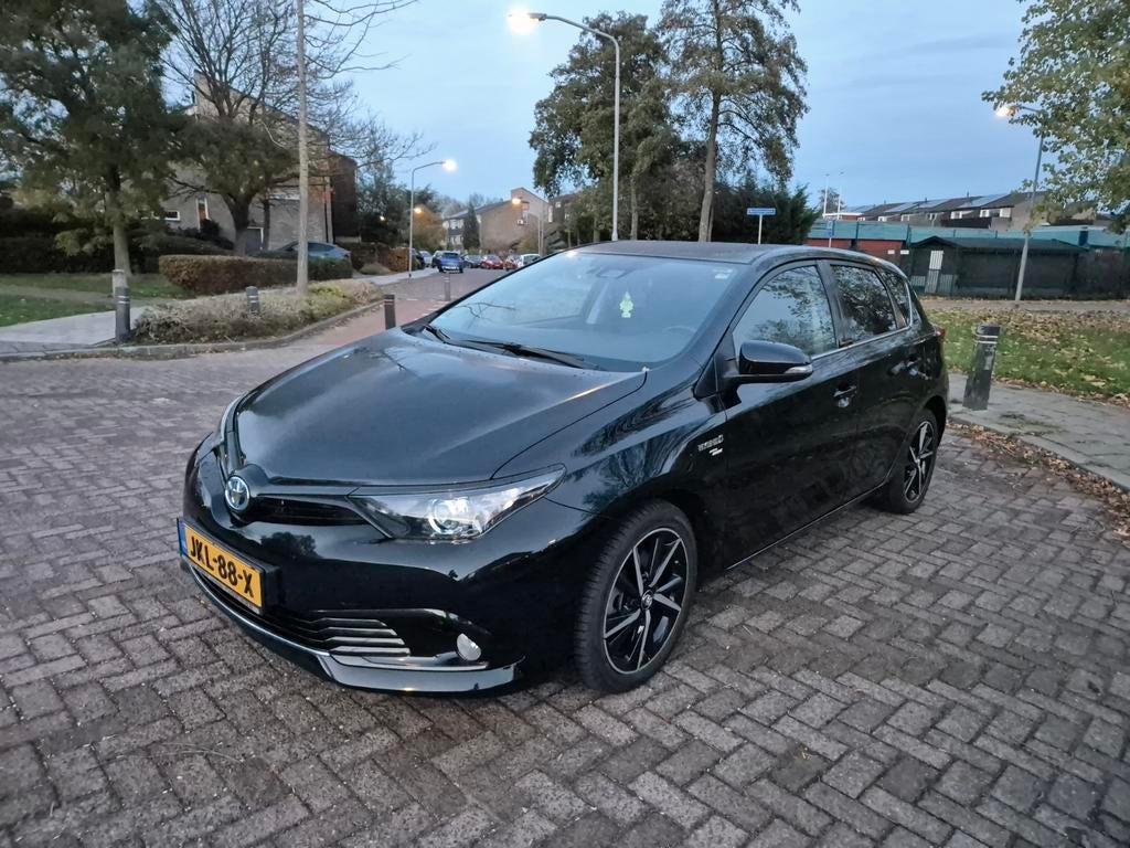 Toyota Auris 1.8 Hybrid 136pk Aut 2019 Zwart, Auto's, Euro 6, 4 cilinders, Zwart, Stoelverwarming