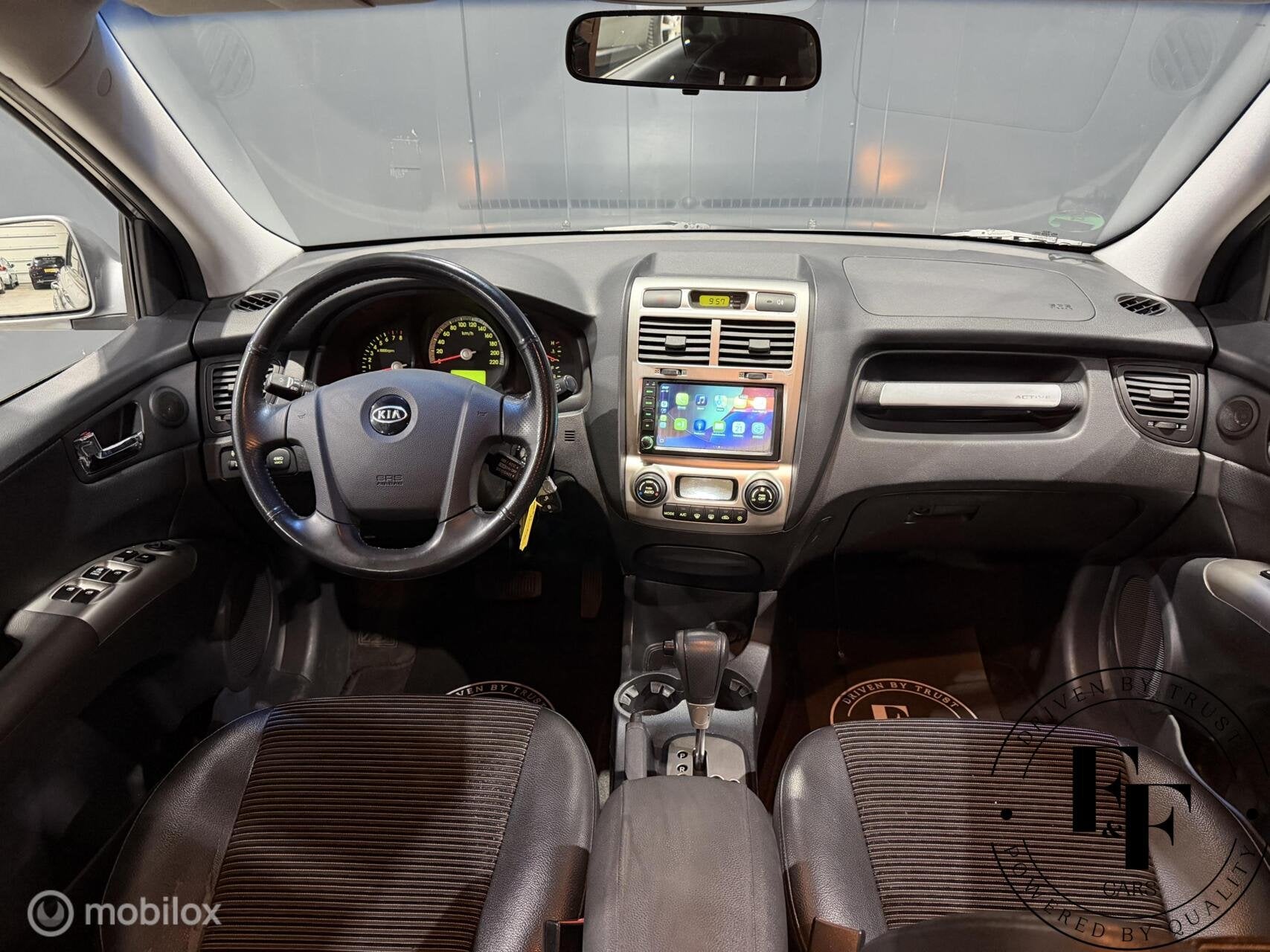 Kia Sportage 2.7 V6 Adventure 4WD|Automaat|Trekhaak|Carplay|, Auto's, Automaat, Zwart, Bedrijf, Vierwielaandrijving