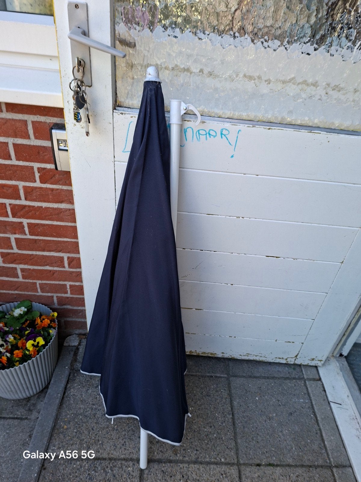 parasol kleur blauw, Ophalen