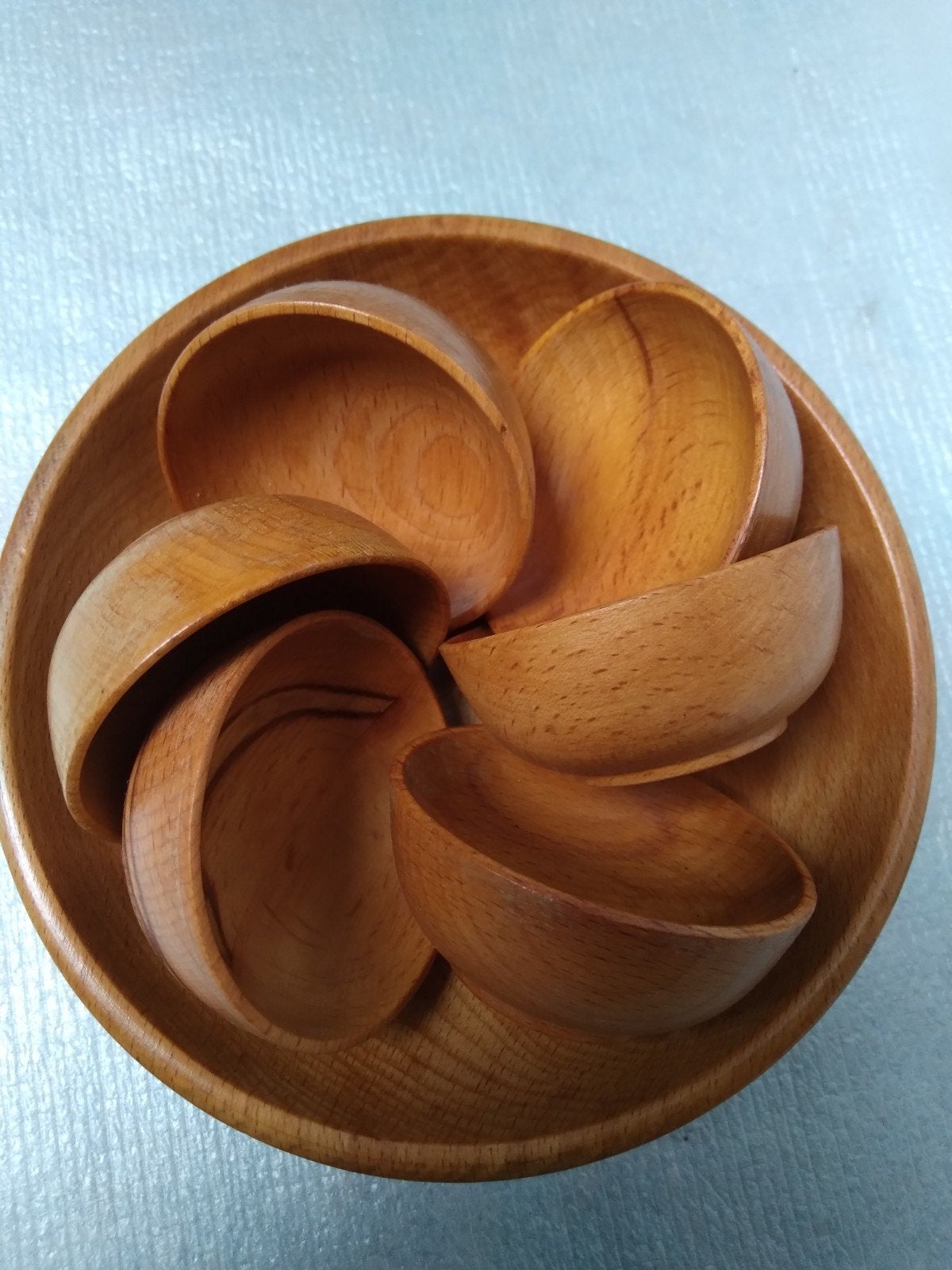 Houten pindaset, Ophalen