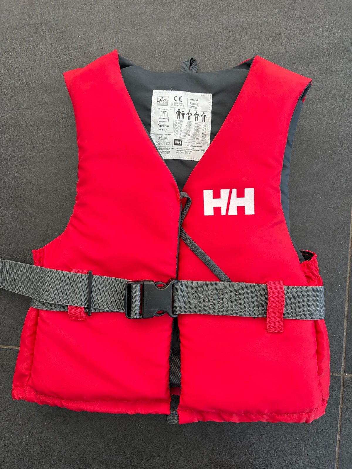 Helly Hansen Zwemvest XS (40-50 kg) - Rood, Watersport en Boten, Watersportkleding, Ophalen of Verzenden, Zo goed als nieuw, Dame of Heer
