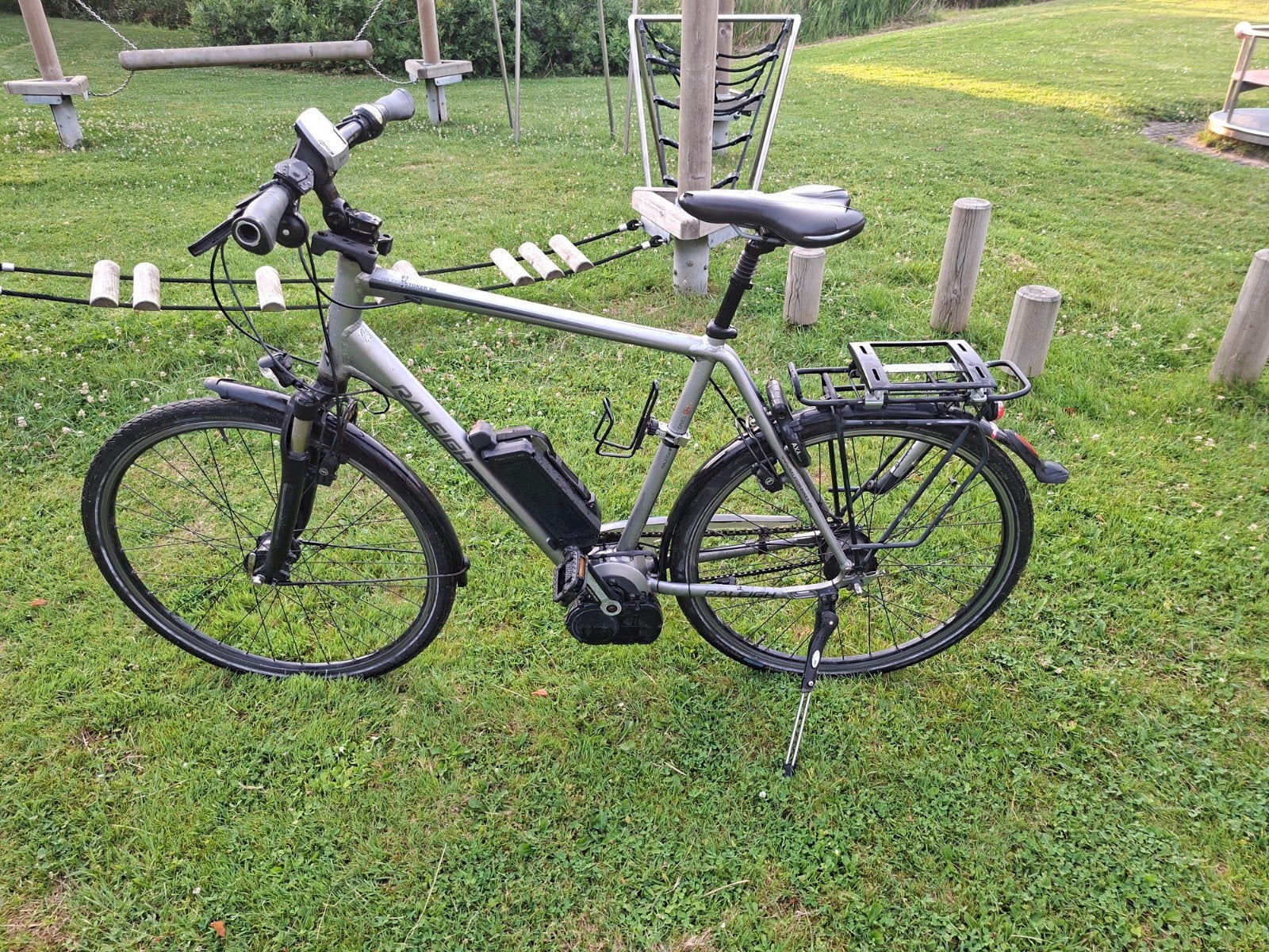 Raleigh E-bike - Maat 63 - Bosch Middenmotor, 59 cm of meer, Ophalen, Gebruikt, Overige merken