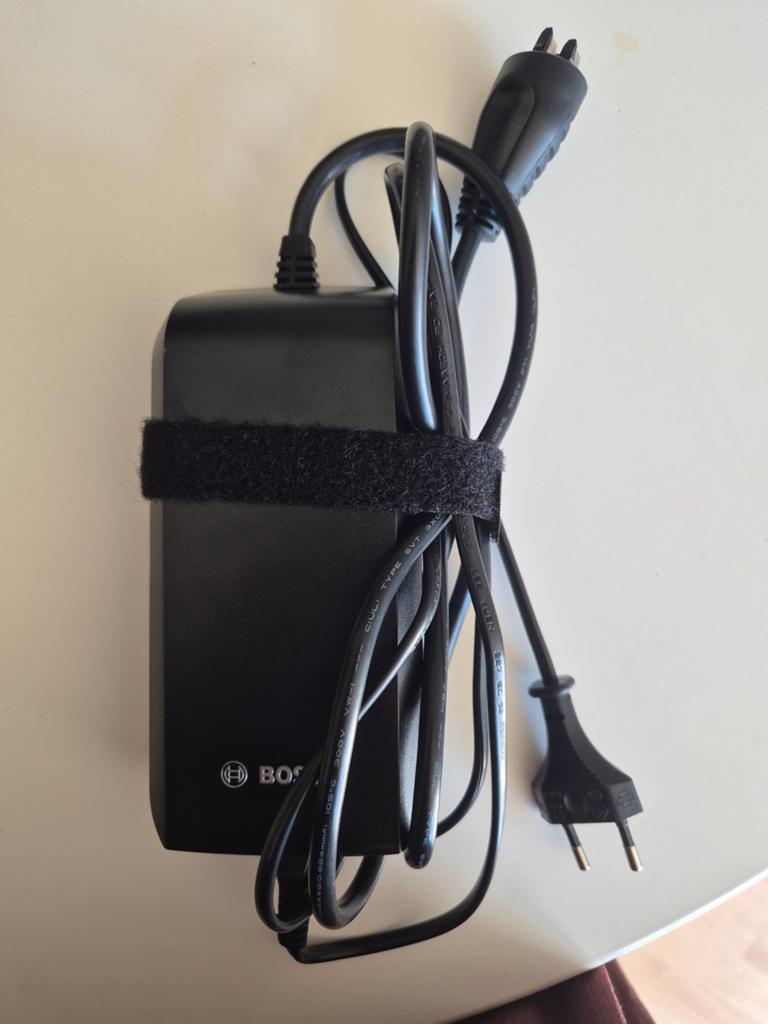 Bosch oplader elektrische fiets (Compact Charger), Fietsen en Brommers, Ophalen of Verzenden, Zo goed als nieuw