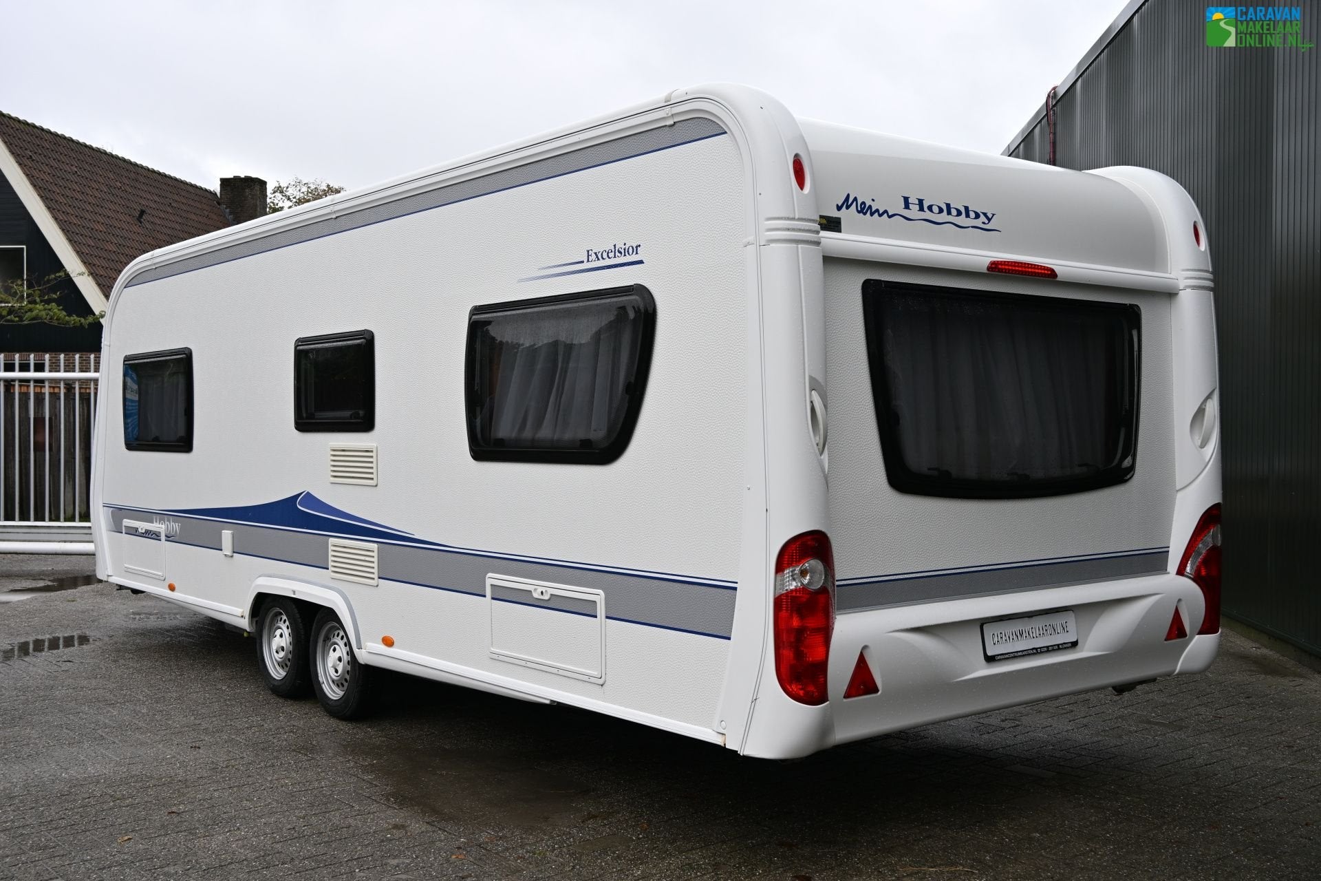 Hobby Excelsior 650, Caravans en Kamperen, Rondzit, Hobby, 7 tot 8 meter, Bedrijf