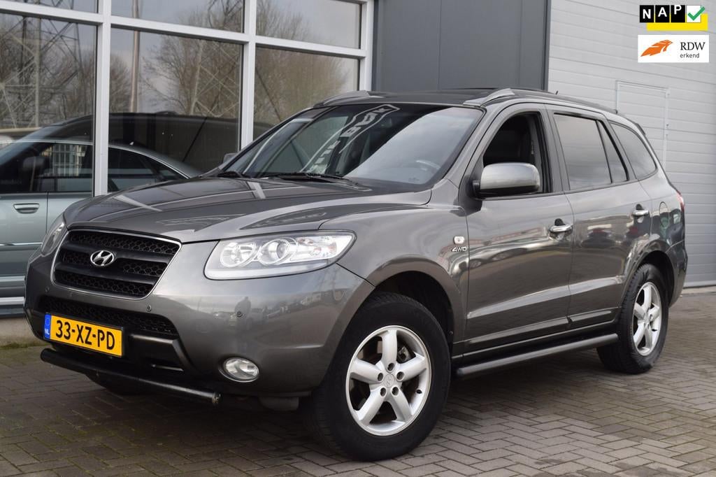 Hyundai Santa Fe 2.7i V6 4WD Style 7p. | Automaat | Leder |, Auto's, Automaat, Santa Fe, Gebruikt, Zwart