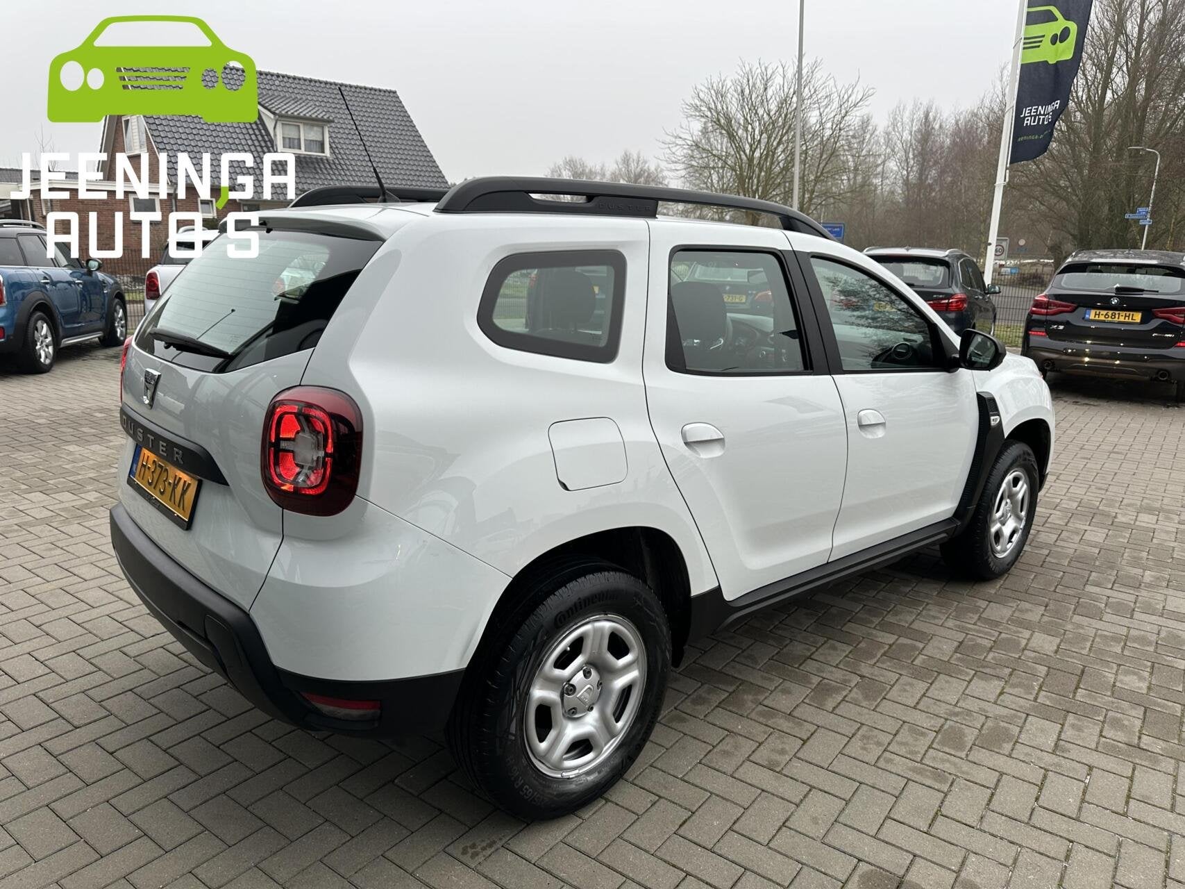 Dacia Duster TCe 100 Comfort|Airco|Cruise, Gebruikt, 4 cilinders, Duster, Wit