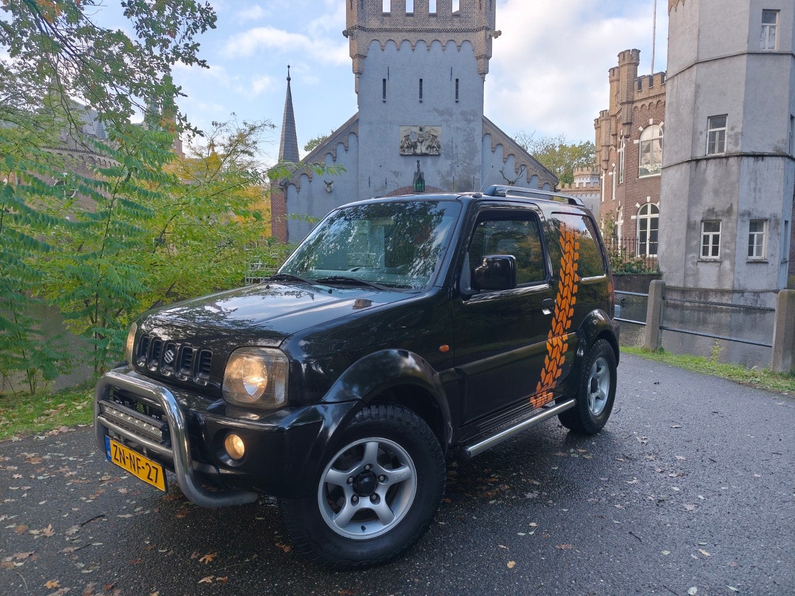 Suzuki Jimny 1.3 JLX 4x4 zwart / airco / apk 11-2027 / NAP!, Auto's, Stof, 40 €/maand, 4 cilinders, 4 stoelen