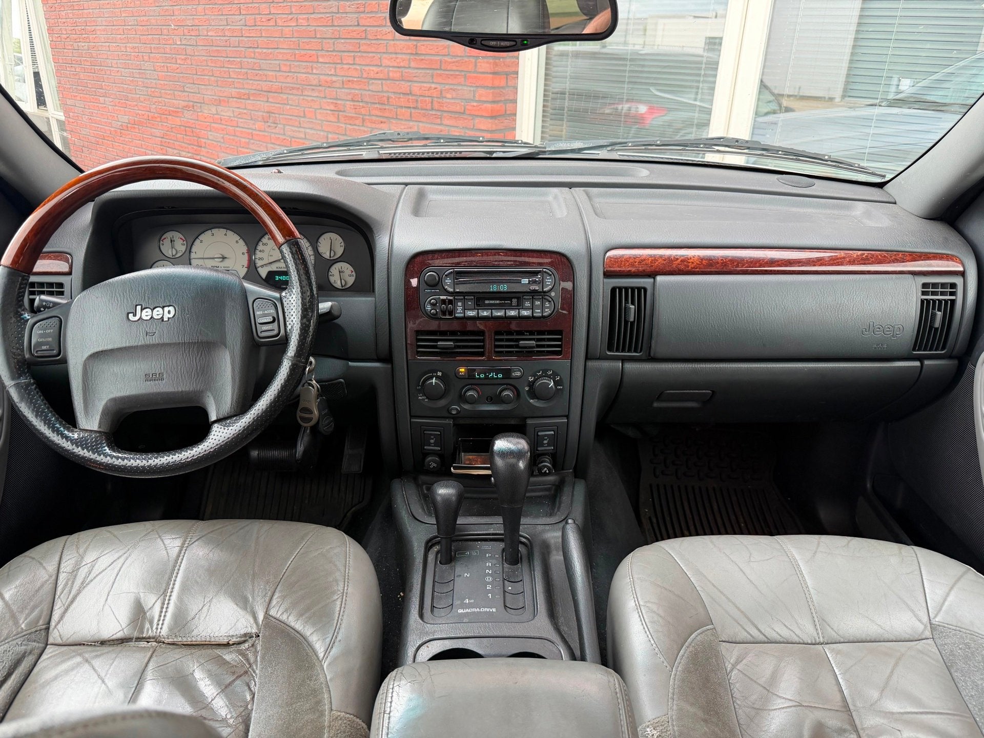 Jeep Grand Cherokee 4.7i V8 Overland High Output / Pano / Le, Auto's, Automaat, Gebruikt, Met garantie (alle), 1969 kg