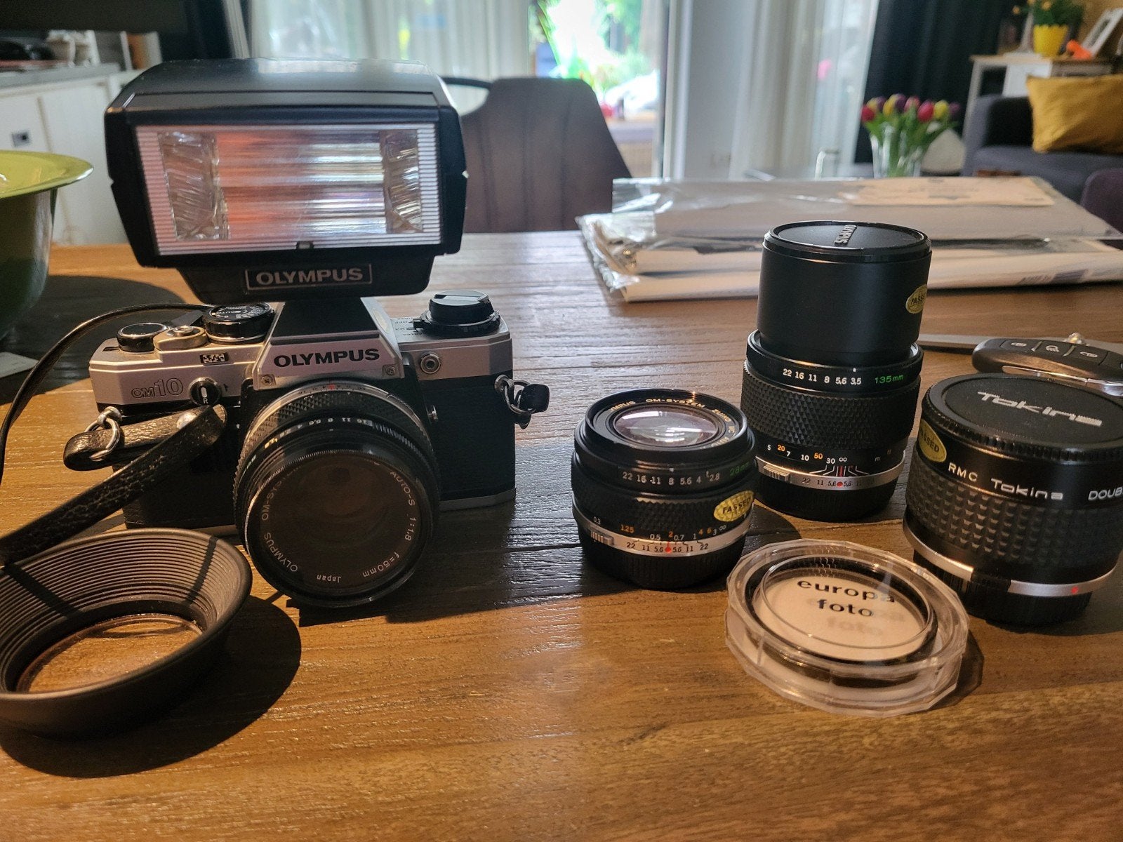 Olympus OM-10 Spiegelreflexcamera met flitser en lenzen, Ophalen of Verzenden, Gebruikt, Spiegelreflex, Olympus