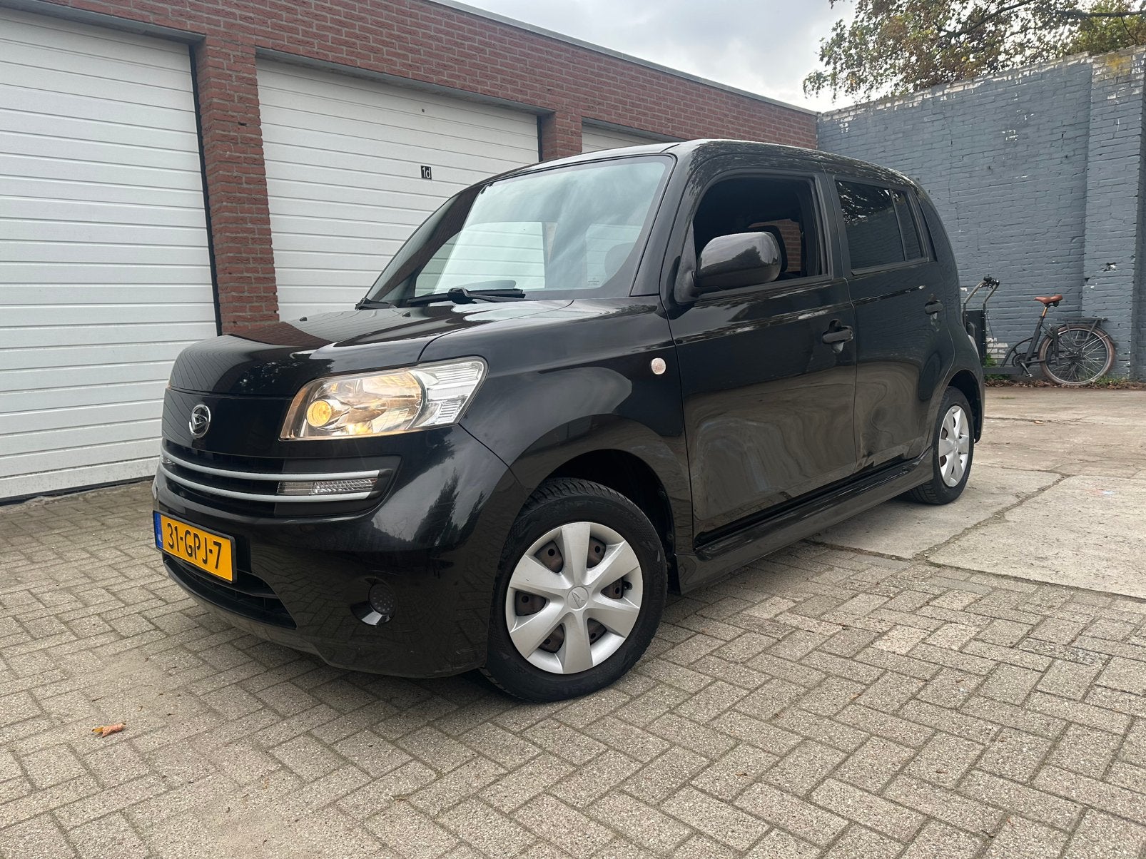 Daihatsu Materia 1.3 2008 | 1e eigenaar | Airco, Auto's, Voorwielaandrijving, 40 €/maand, Zwart, 4 cilinders