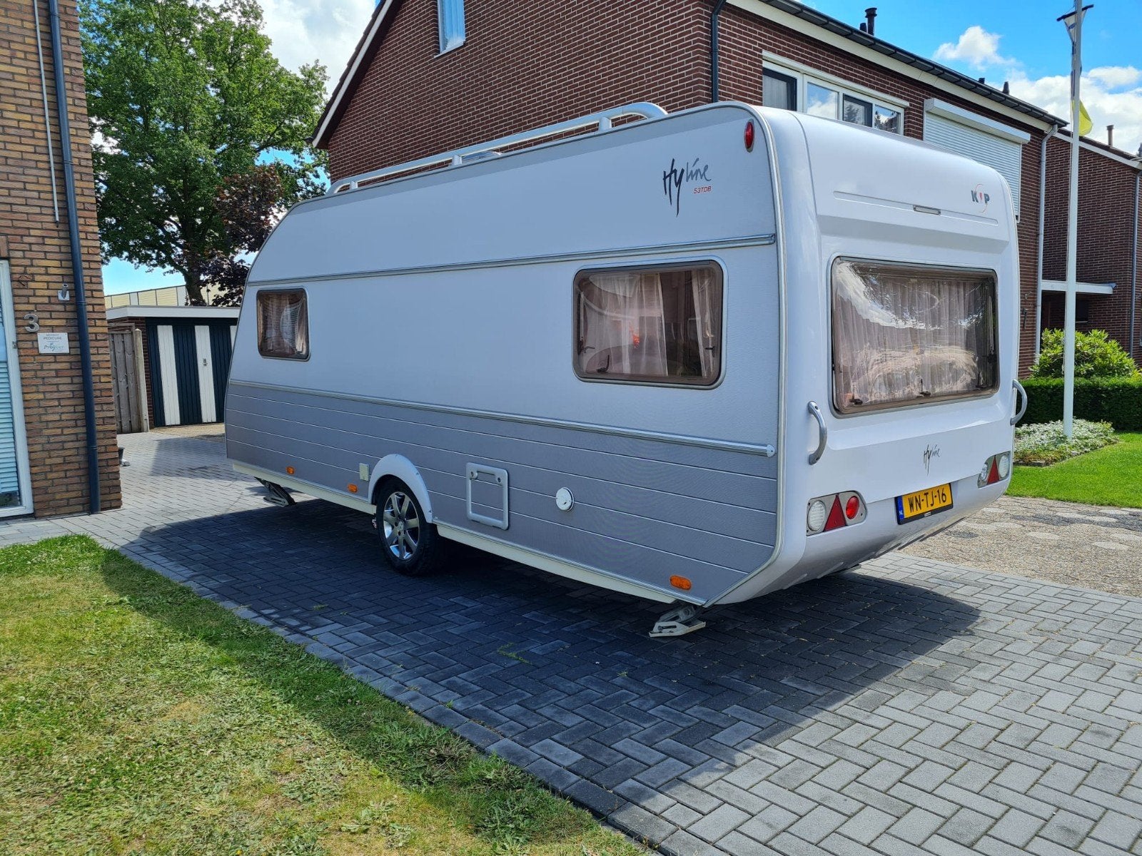 Bijzonder nette Kip Hyline 53 TDB airco, mover + level, Caravans en Kamperen, Caravans, Omvormbare zithoek, Rondzit, Kip, Particulier
