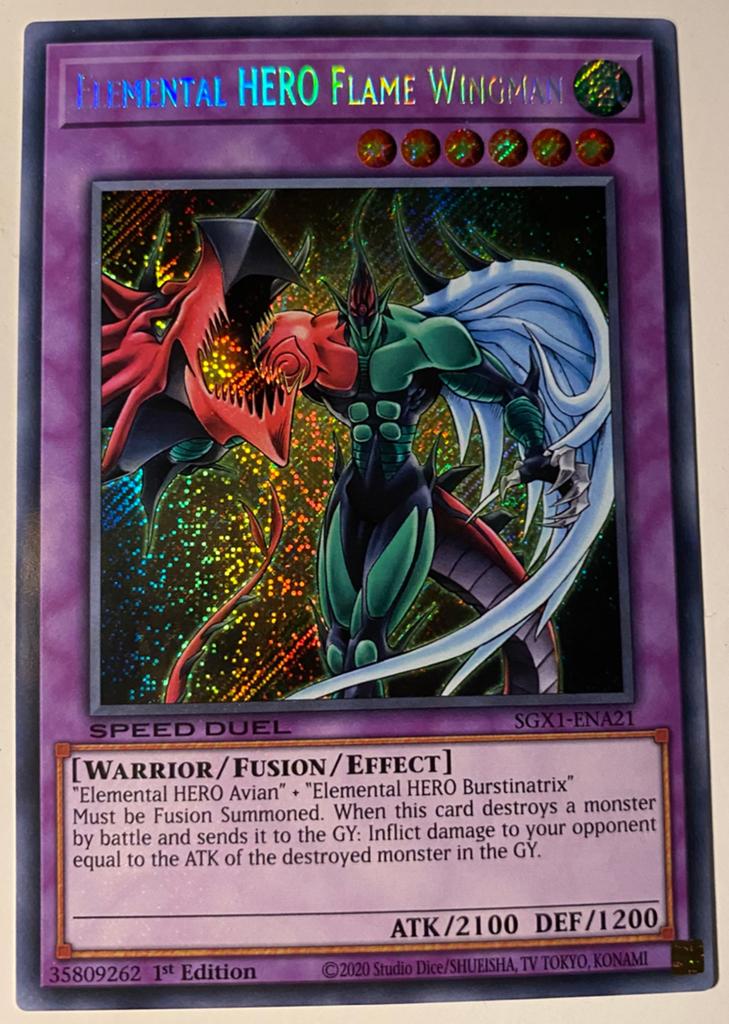 Yu-Gi-Oh! Elemental HERO Flame Wingman SGX1 1st Edition !, Ophalen of Verzenden, Zo goed als nieuw, Losse kaart, Foil