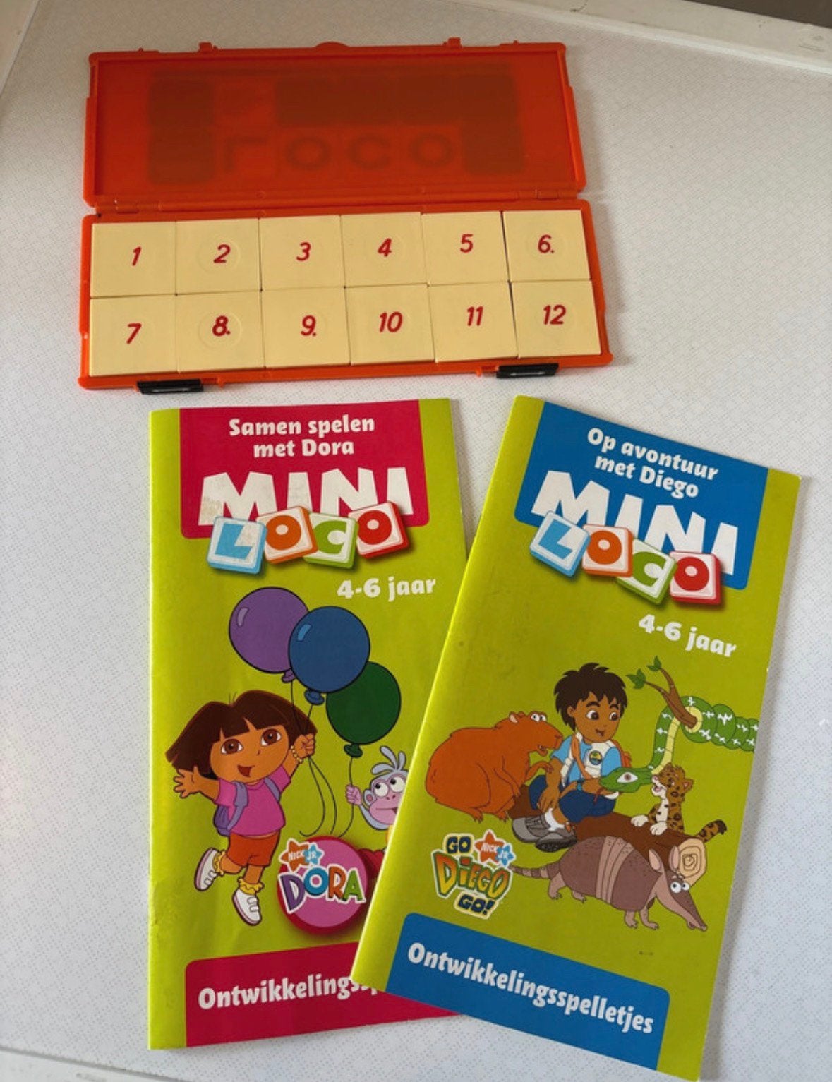 Mini loco dora boekjes en stenen nog netjes, Ophalen of Verzenden, Zo goed als nieuw