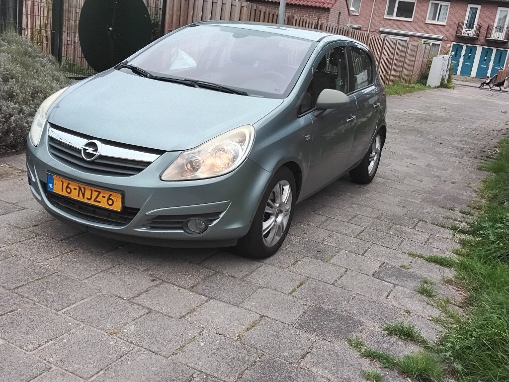 Opel Corsa 1.2 16V 5D Easytronic 2010 Grijs, Auto's, 4 cilinders, Sound system, 49 €/maand, Origineel Nederlands