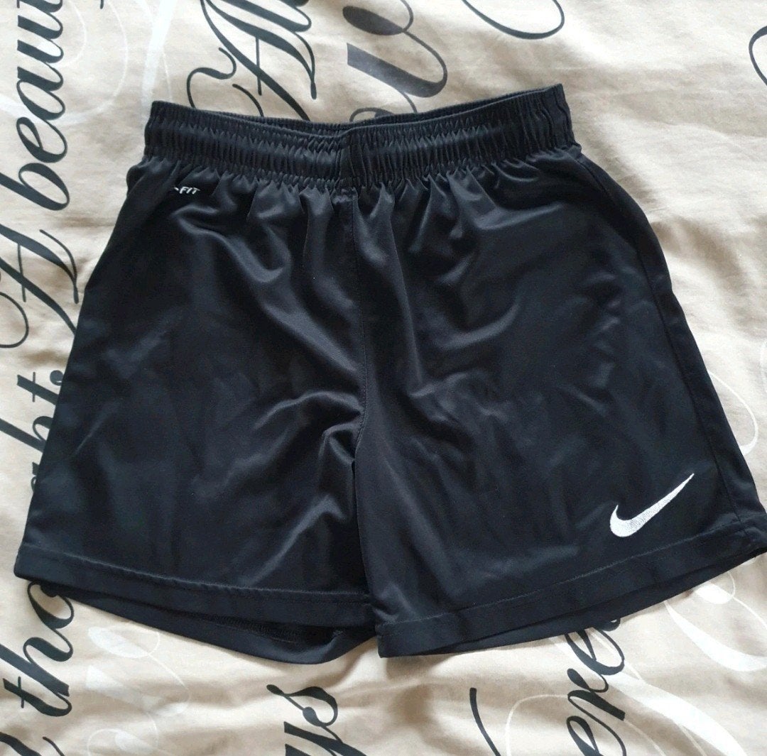 Nike mt S 140 denk ik...🖤🤍, Kinderen en Baby's, Kinderkleding | Maat 140, Sport- of Zwemkleding, Ophalen of Verzenden, Zo goed als nieuw