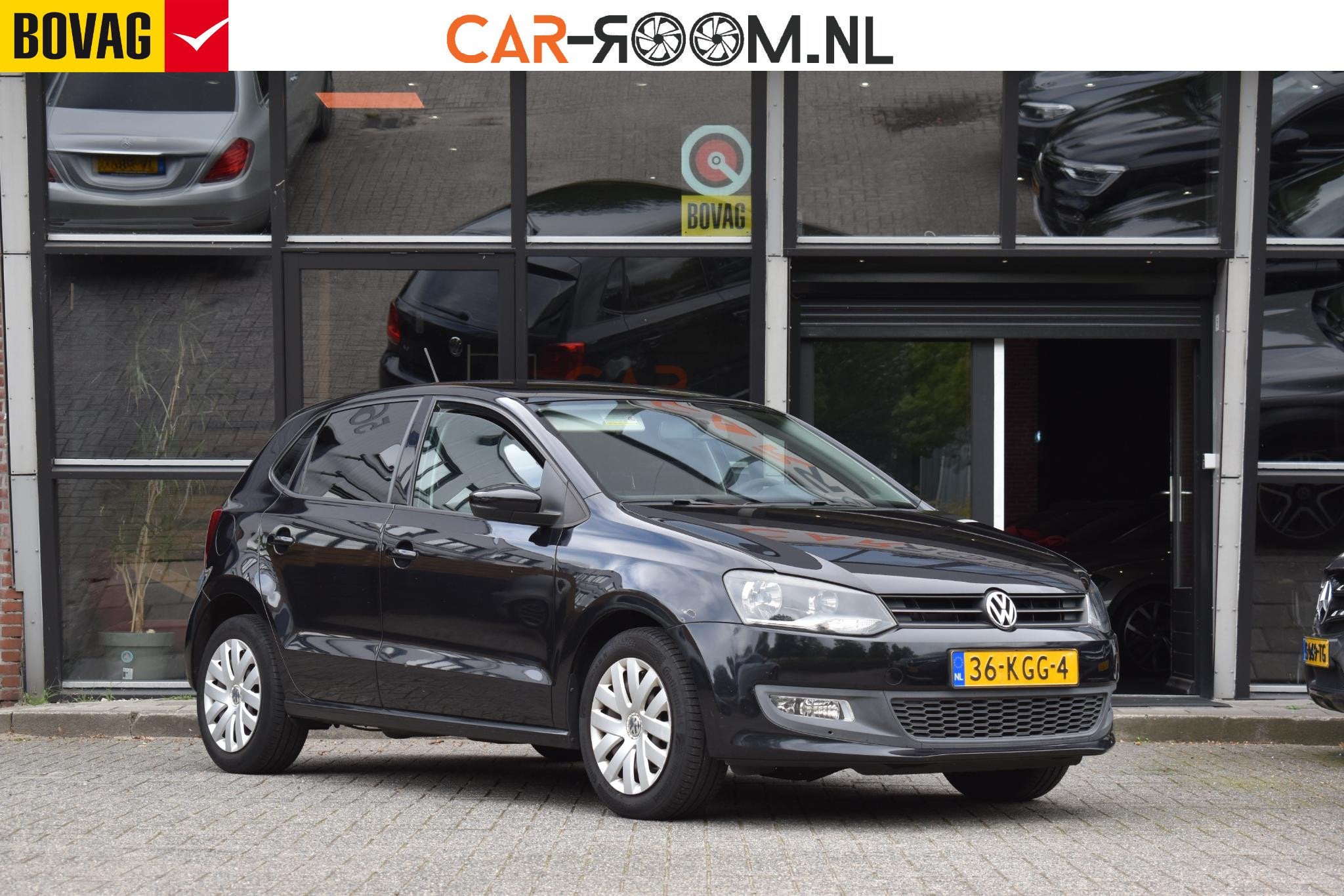 Volkswagen Polo 1.4-16V Comfortline Cruise Navi Airco Blueto, Auto's, Voorwielaandrijving, 4 cilinders, Met garantie (alle), Zwart