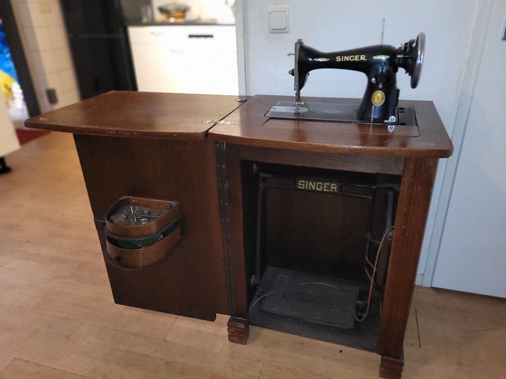 antieke Singer trapnaaimachine, Ophalen