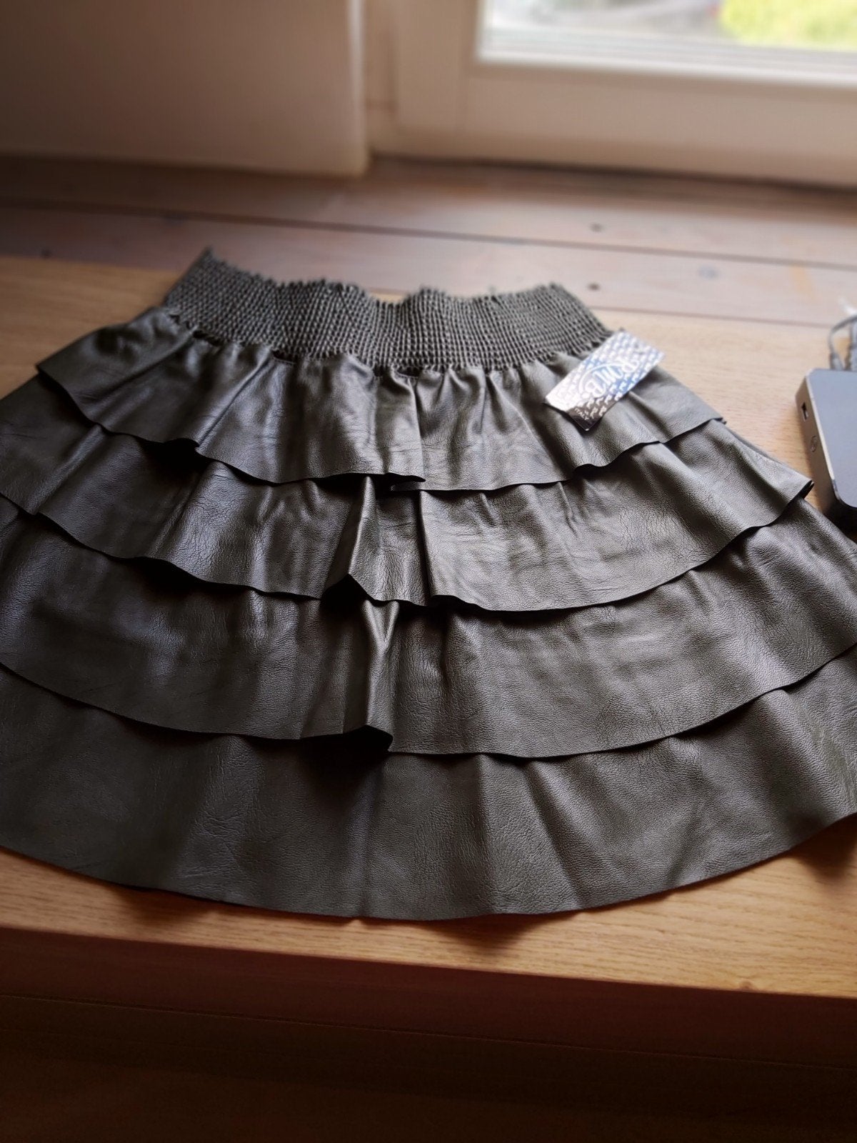 RMB Gelaagde Minirok in Kunstleer - Maat taille Unique nieuw, Ophalen, Overige kleuren, Nieuw, Maat 34 (XS) of kleiner