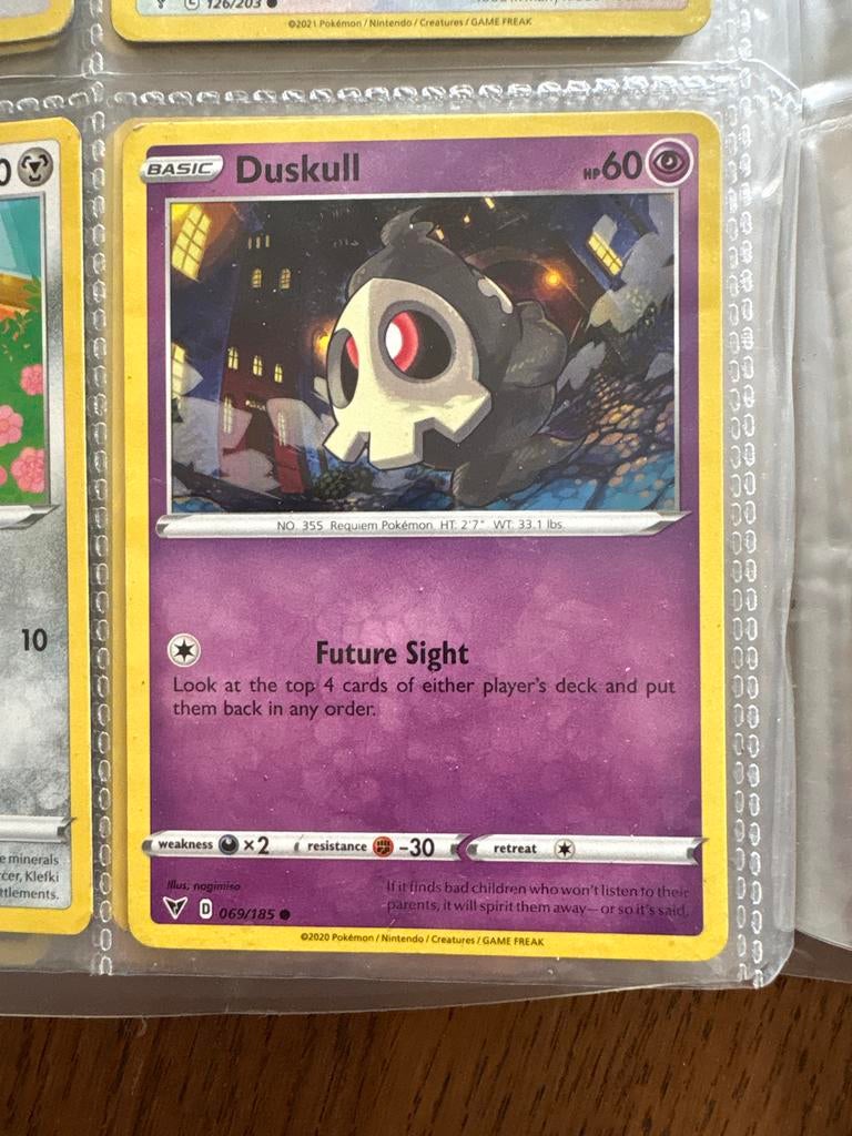 Pokémon Kaart Duskull 069/185 - Basic HP60, Ophalen, Zo goed als nieuw, Losse kaart