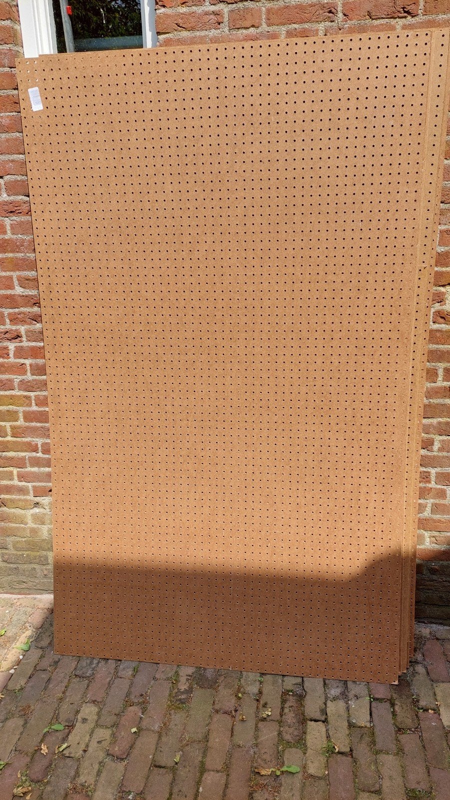 7 Geperforeerde hardboard bedplaten, Ophalen