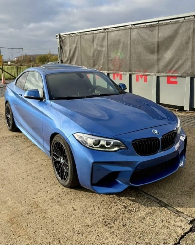 BMW m235i - 50k km 2016 US import, Automaat, Achterwielaandrijving, Zwart, Blauw