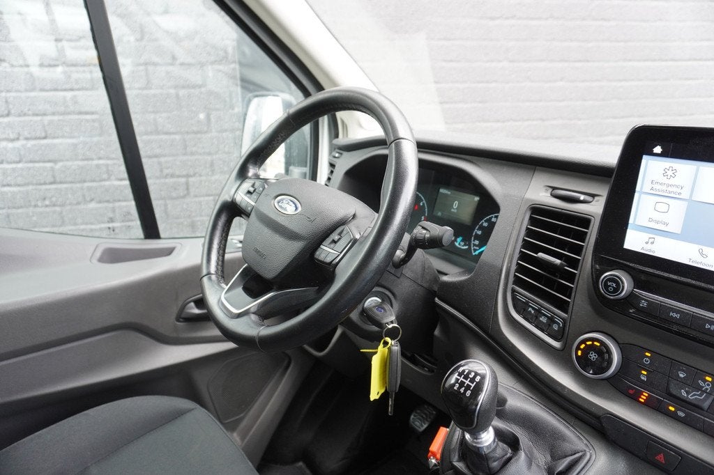 Ford Transit 2.0 TDCI 130PK L2H2 EURO 6 - Airco - Navi - Cru, Auto's, Voorwielaandrijving, Stof, 4 cilinders, Wit