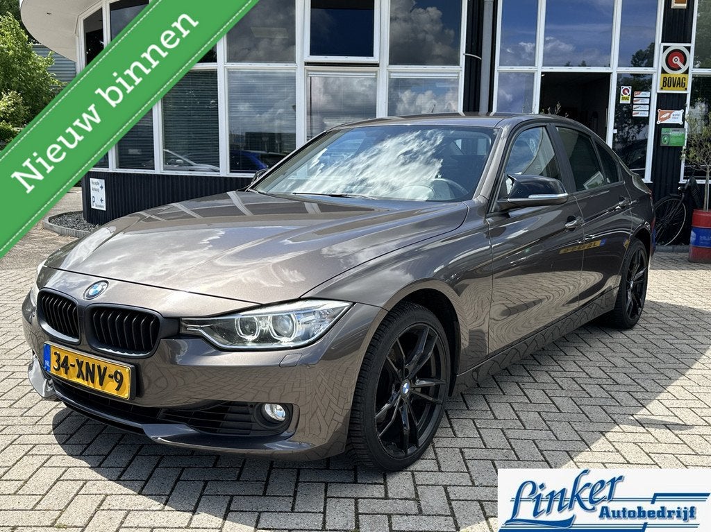 BMW 3-serie 320i High Executive - NL-AUTO AUTOMAAT PDC ACHTE, Euro 5, Gebruikt, Zwart, 4 cilinders