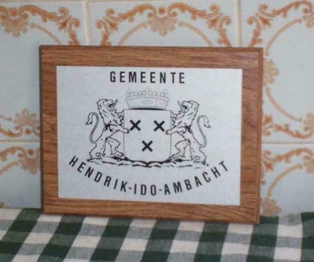 wanddecoratie hendrik ido ambacht met wapenschild, Ophalen