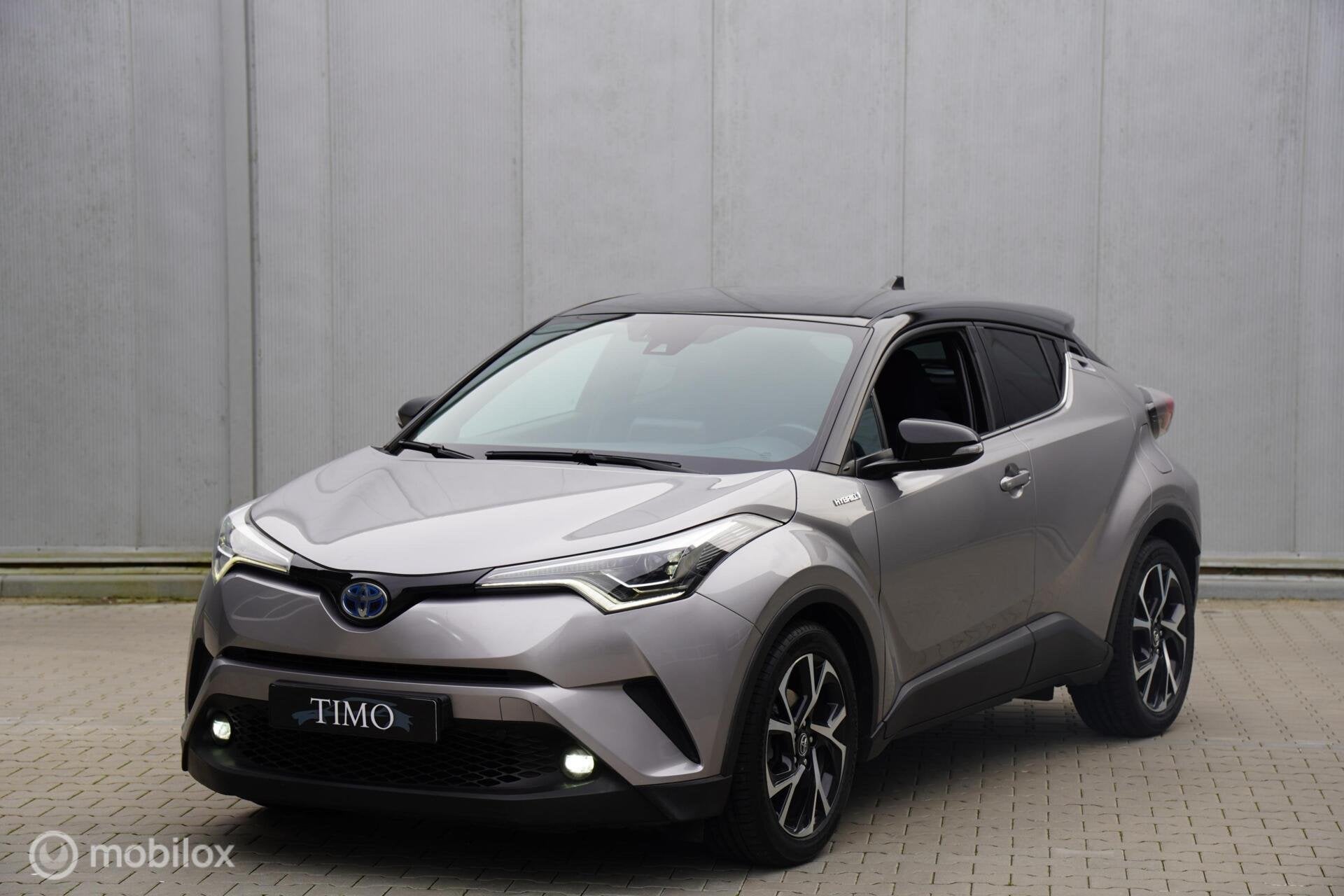 Toyota C-HR 1.8 Hybrid Bi-Tone 2017 98.000 KM, Auto's, Euro 6, 4 cilinders, 98 pk, 26 km/l