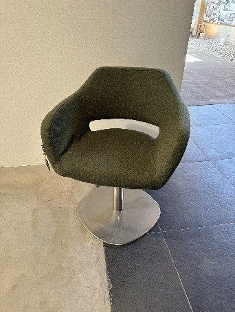 Sateliet groene gestoffeerde draai stoel, Ophalen