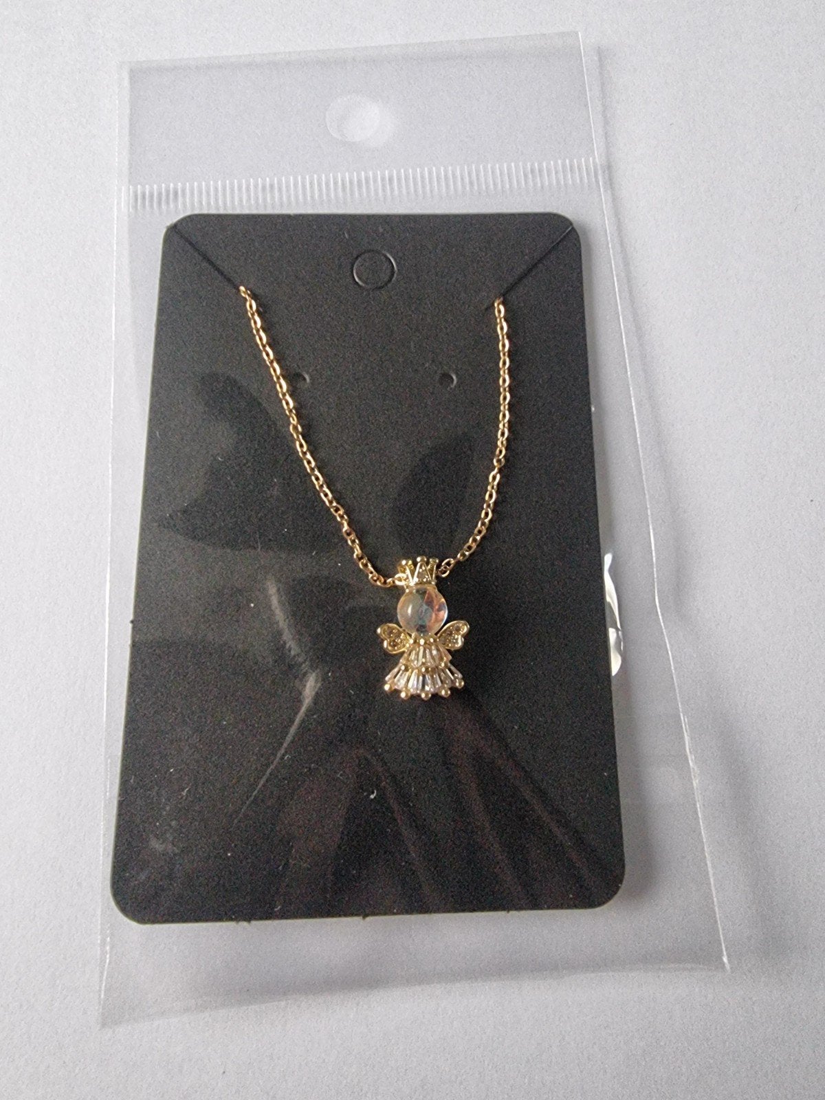 Goudkleurige ketting met engel hanger, Nieuw, Ophalen of Verzenden, Goud, Overige materialen